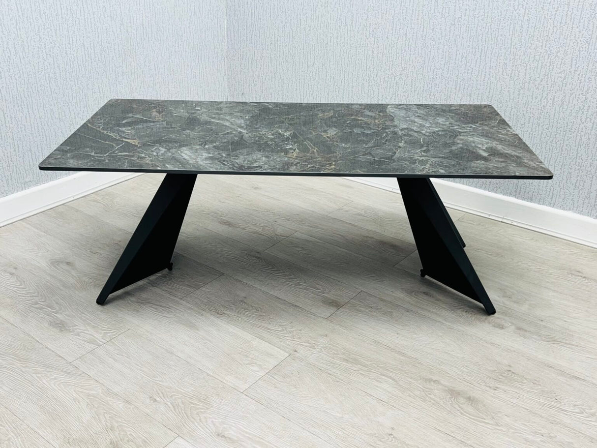 ceramic coffee table for living room. black legs with gold, black and grey ceramic top